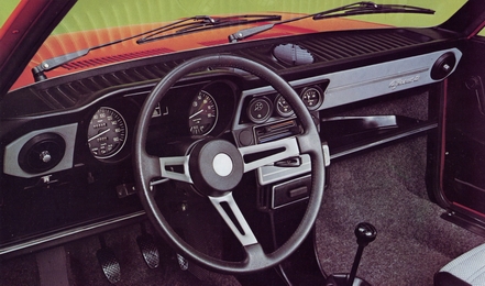 The modified dashboard with aditional gauges and rev-counter.